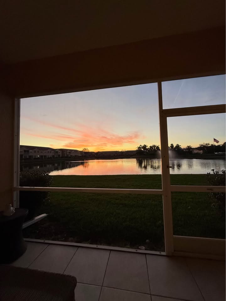Breathtaking sunset lake view from screened lanai