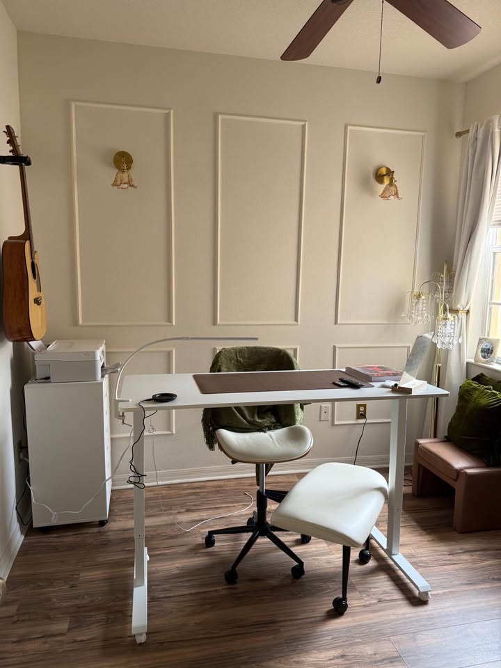 Third bedroom with decorative wall paneling